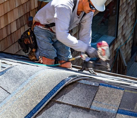 Ben Ross Roofing | Rock Hill, South Carolina | Man replacing shingles on a roof